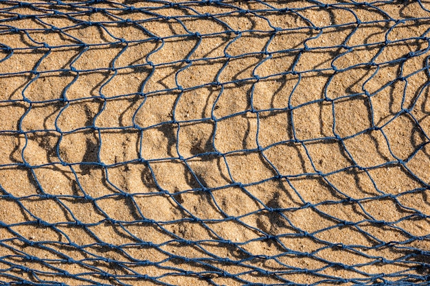 Fishing net on sand