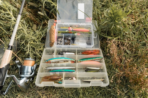 Free photo fishing tool box on the ground