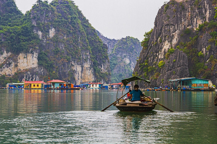Free Photo a fishing village in ha long bay in viet nam