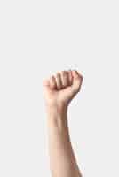 Free photo fist up victory symbol female hand