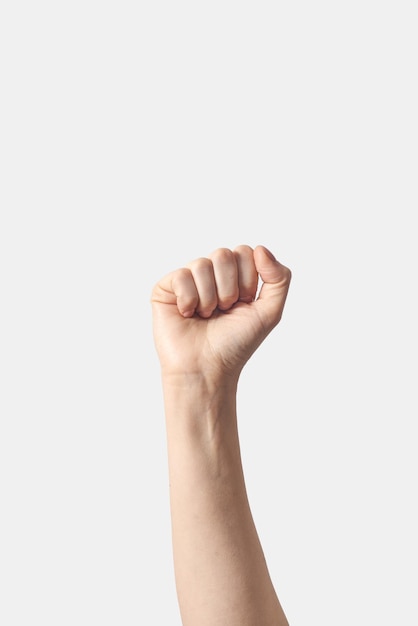 Fist up victory symbol female hand