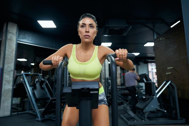 Fit woman doing cardio in gym