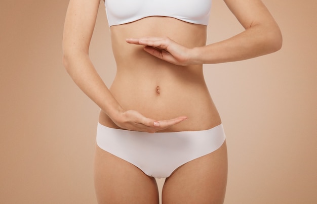 Fit woman wearing white lingerie