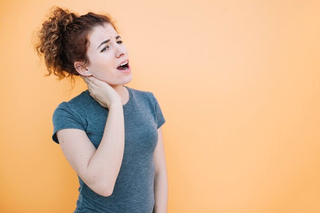 Fit woman with injured neck