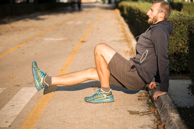 Fitness boy stretching