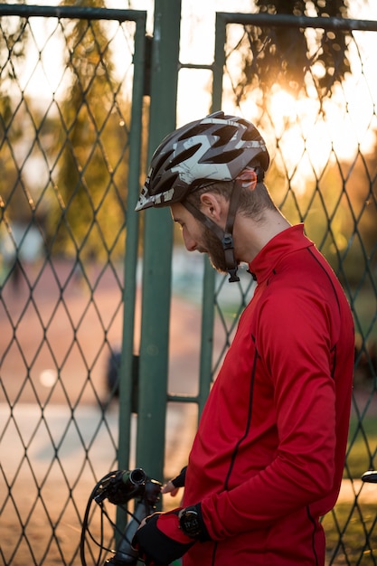 Fitness boy with bike