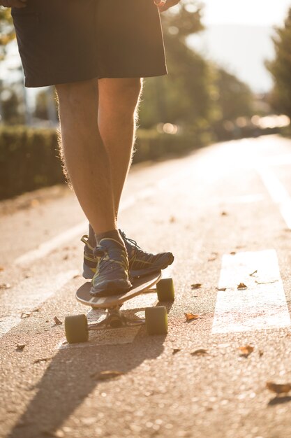 Fitness boy with skateboard