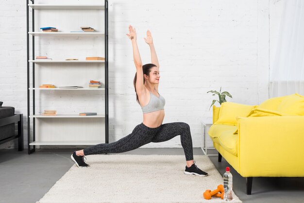 Fitness girl practising yoga