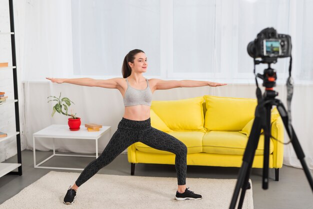 Fitness girl recording herself