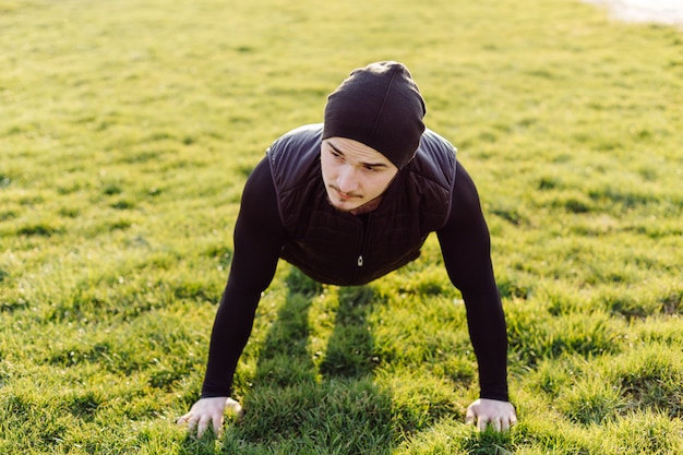 Fitness man training outdoors, living active healthy