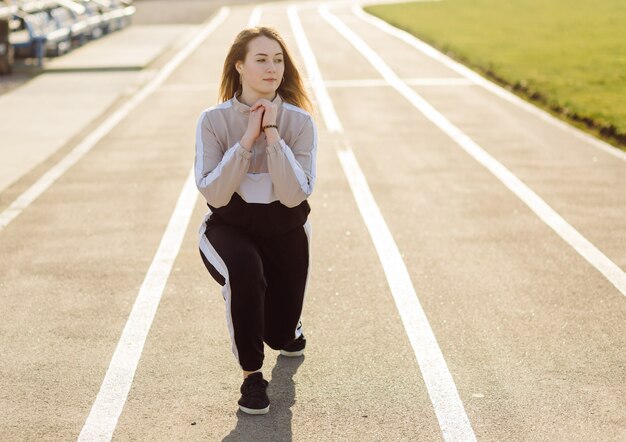 Fitness woman training outdoors, living active healthy