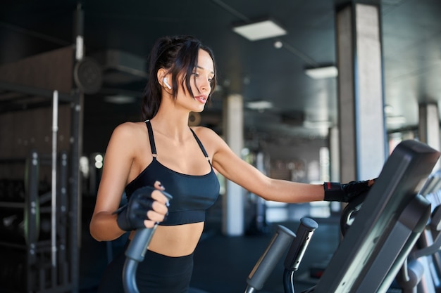 Fitness woman training on treadmill