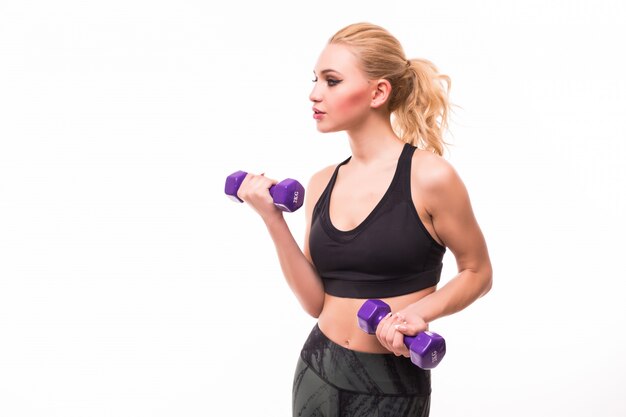 fitness woman working out with blue dumbbells