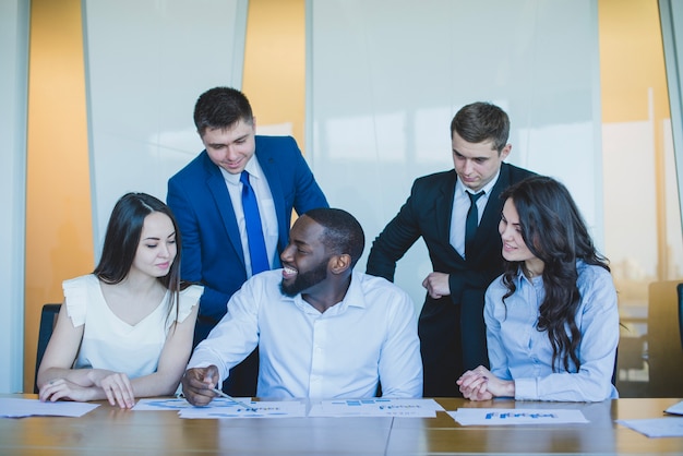 Five co workers in office