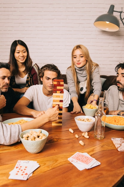 Five friends playing tabletop game