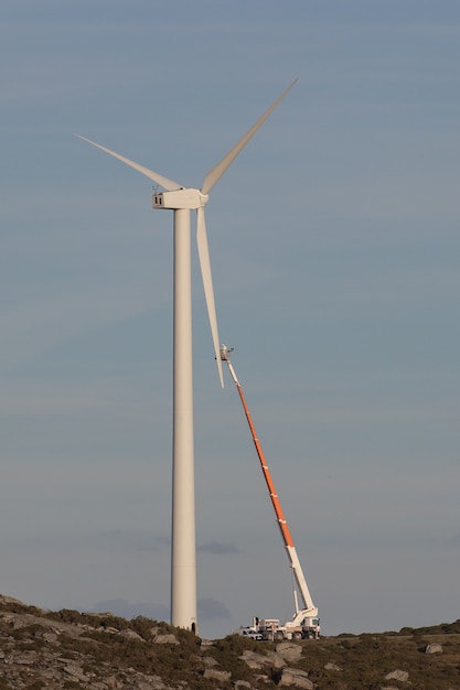 Free photo fixing a wind turbine