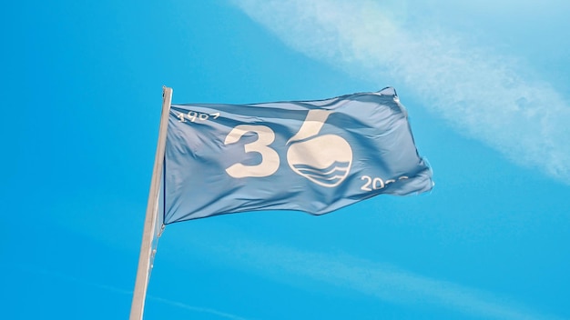 Free photo flag of the blue beaches in albir spain