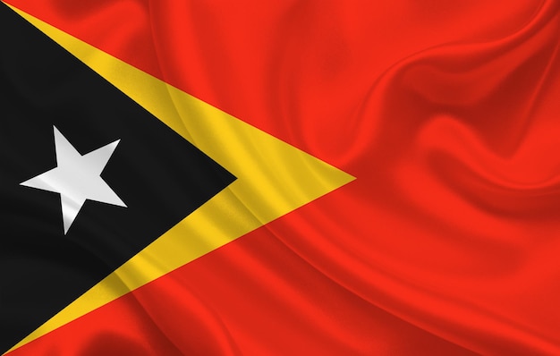 Flag of timor country on wavy silk fabric background panorama - illustration