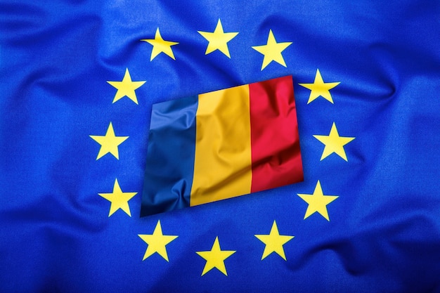 Premium Photo | Flags of the romania and the european union. romanian flag and eu flag. flag inside stars. world flag concept.