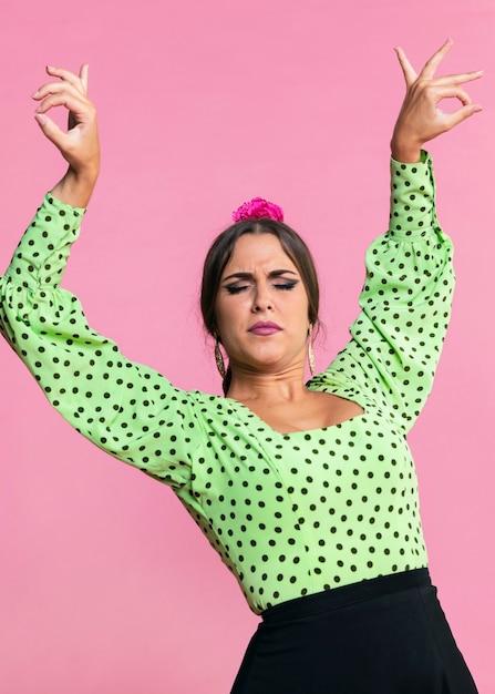 Flamenca dancer with arms up