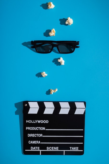 Flat lay 3d glasses for movies and clapper board