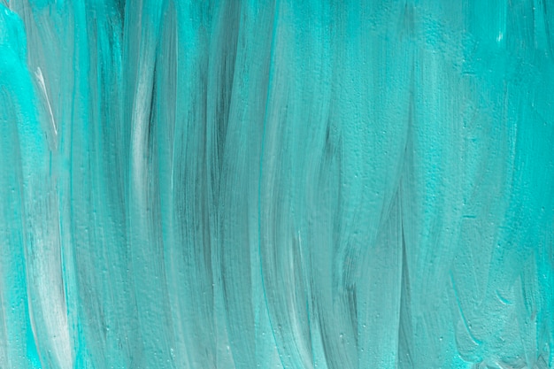 Flat lay of abstract blue paint brush strokes on surface