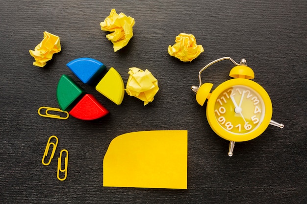 Assortment of office tools with an alarm clock