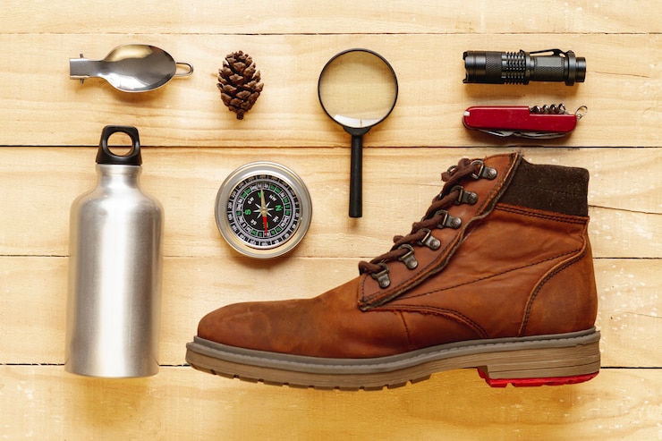 Free Photo flat lay adventure items still life
