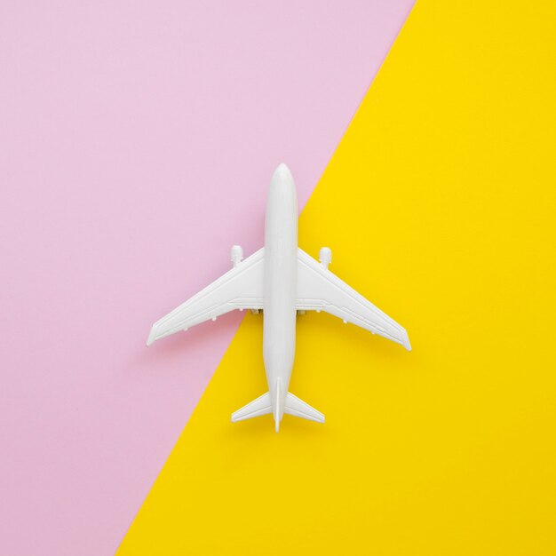 Flat lay airplane toy on table