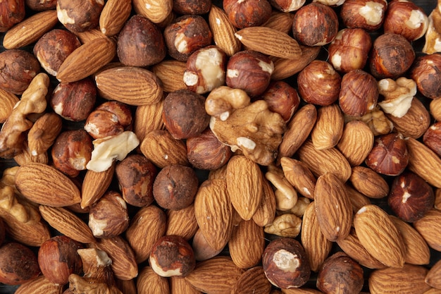 Flat lay of almonds with hazelnuts and walnuts