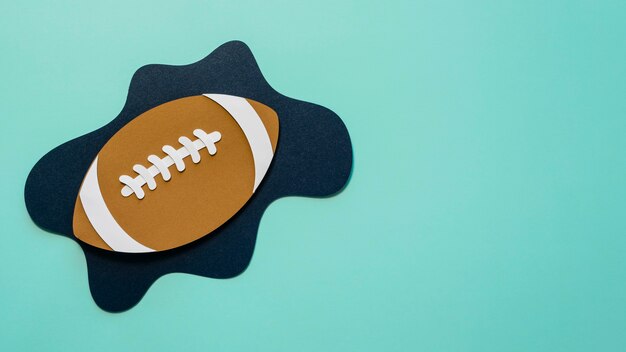 Flat lay of american football with copy space