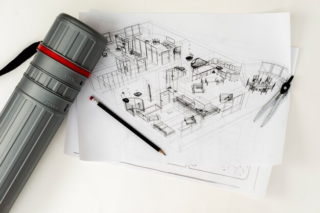 Flat-lay architectural sketch with pencil ant tube