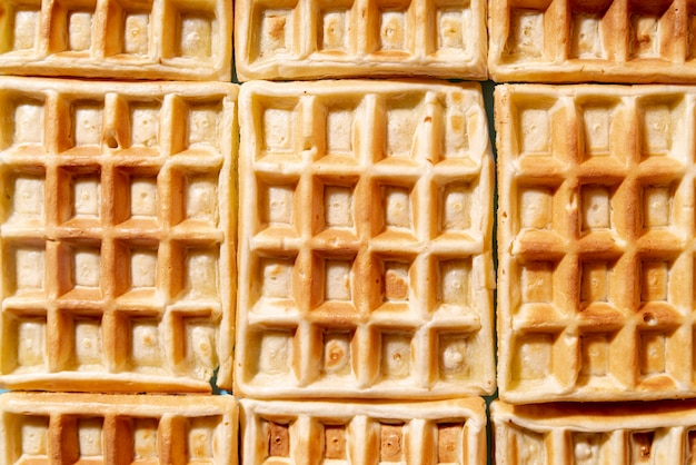 Flat lay of arranged waffles with pattern