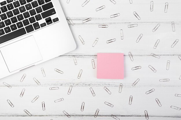 Flat lay arrangement of clips on desk