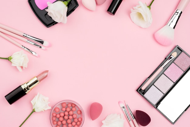 Flat lay arrangement of cosmetics with copy space