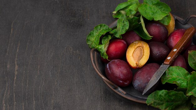 Flat lay arrangement of delicious fruits with copy space