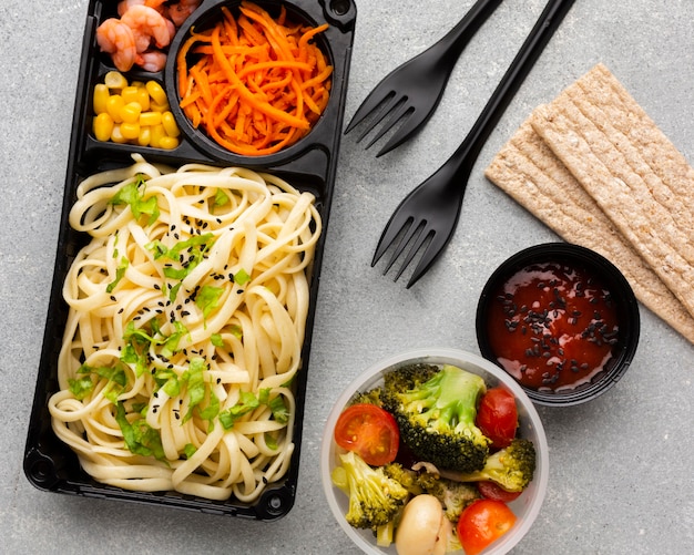 Flat lay arrangement of different foods on the table