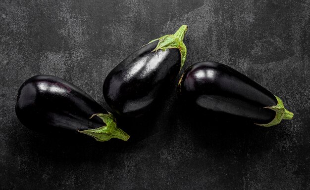 Flat lay arrangement of eggplants