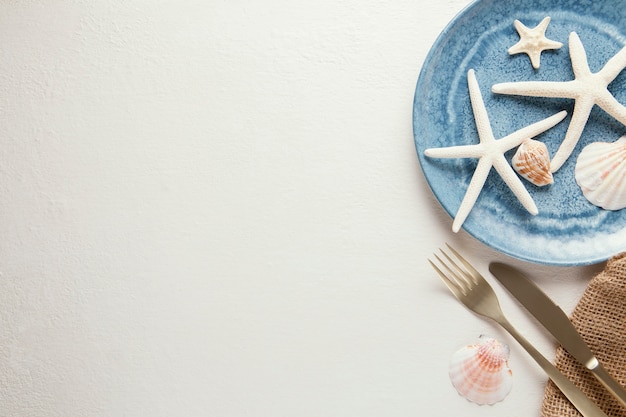 Flat lay arrangement of elegant tableware with copy space