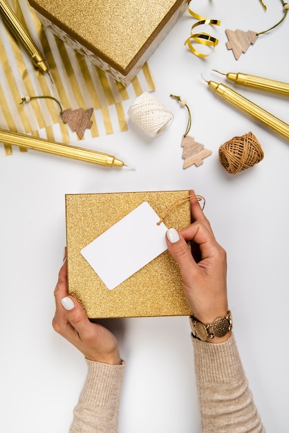 Flat lay arrangement of gift boxes and wrapping paper