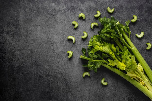 Flat lay arrangement of green edible leaves