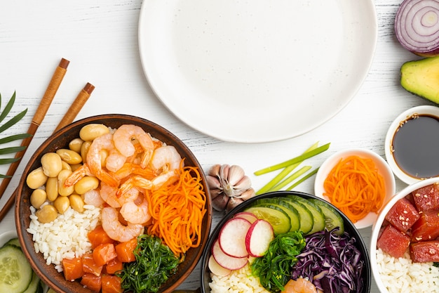 Flat lay arrangement of hawaiian poke bowl