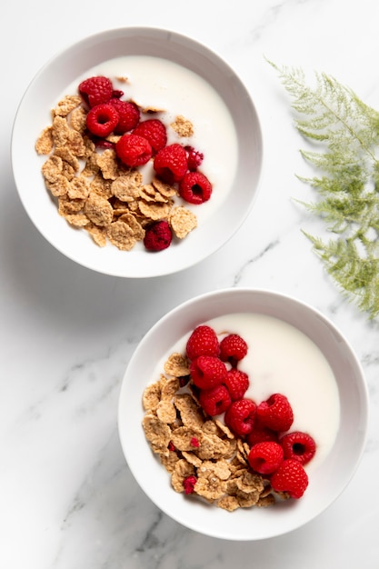 Flat lay arrangement of healthy bowl cereals