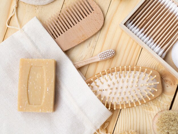 Flat lay arrangement with care products on wooden table