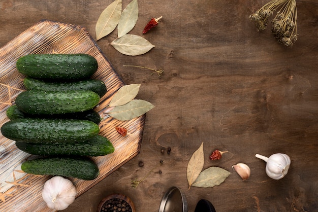 Free photo flat lay arrangement with cucumbers