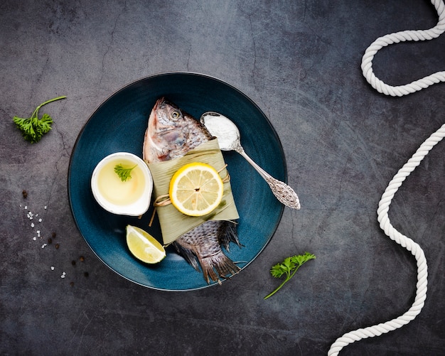 Flat lay arrangement with delicious food and stucco background