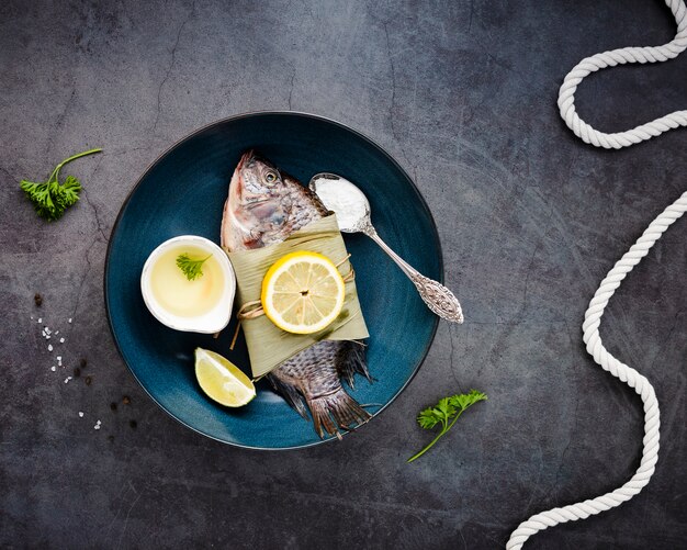 Flat lay arrangement with delicious food and stucco background