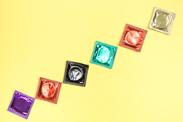 Free photo flat lay arrangement with different condoms