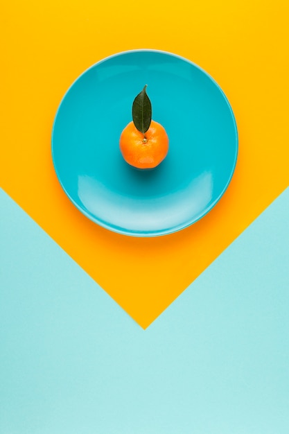 Flat lay arrangement with fruit on a plate