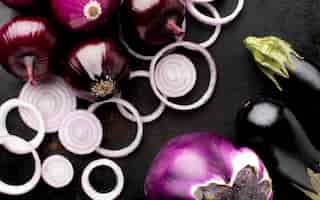 Free photo flat lay arrangement with red onion